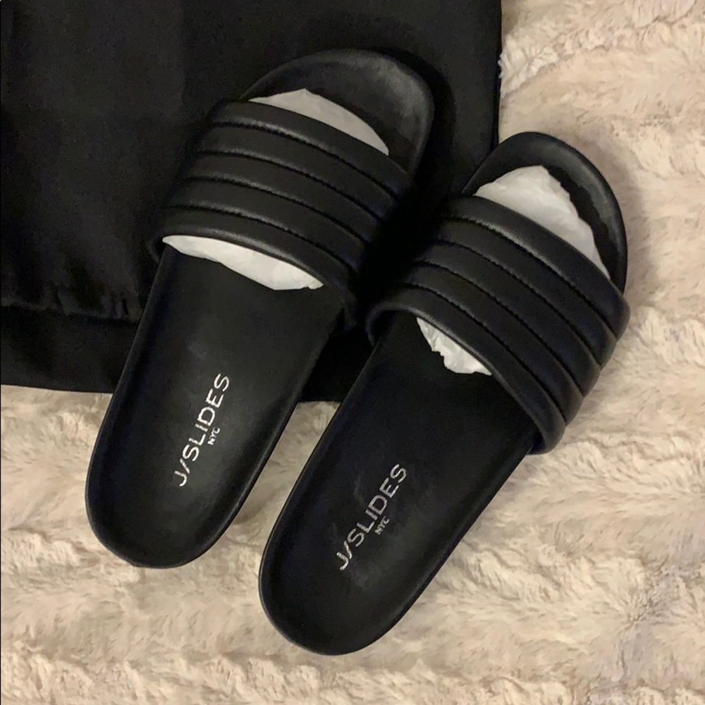 J Slides black leather sandals